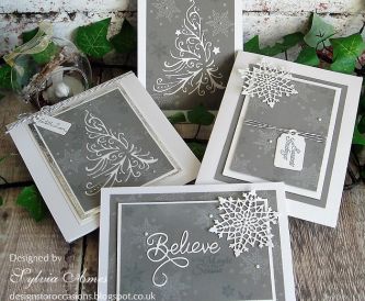 Christmas Greetings In Grey And White with Snowflakes