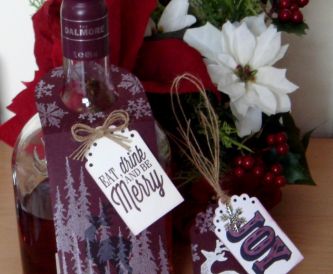 A bottle gift tag with a male theme