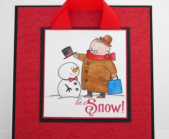 Christmas card with removable decoration